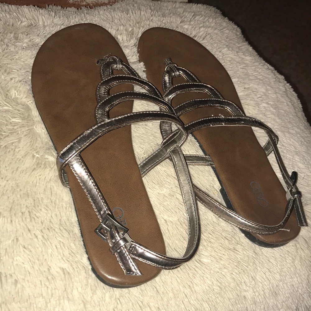 Brown sandals with rose gold straps